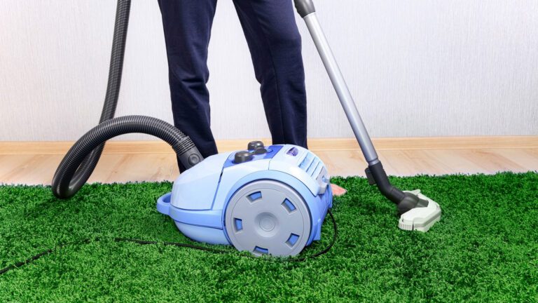 vacuuming artificial grass