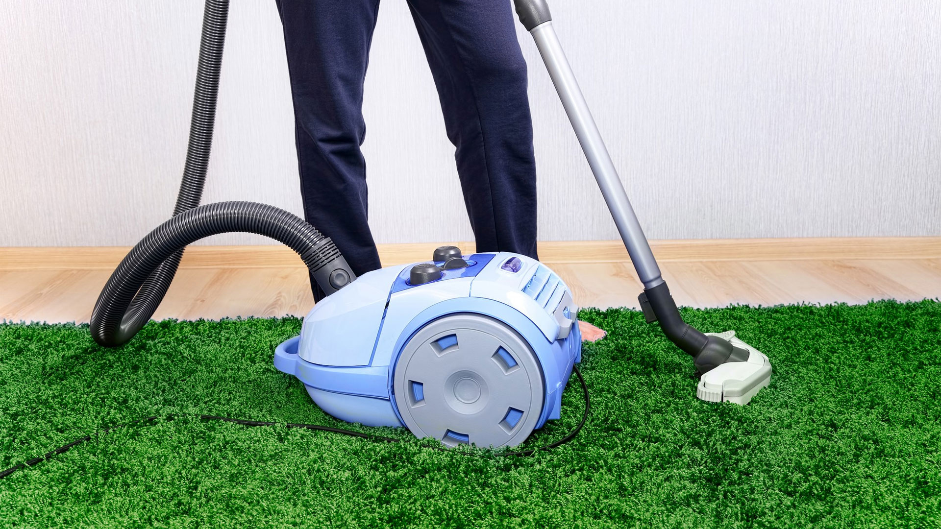 vacuuming artificial grass